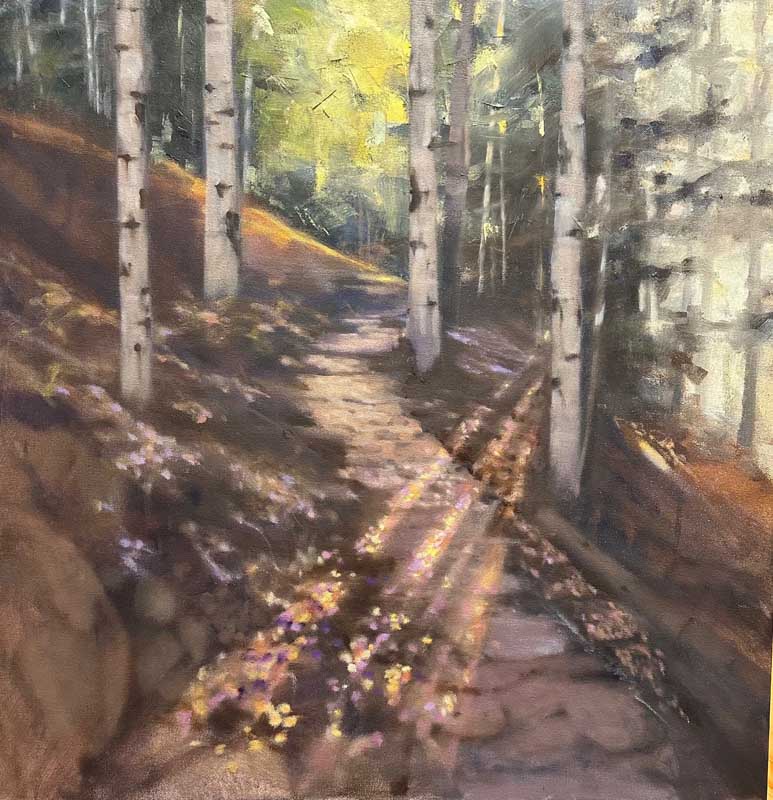 A sunlit forest path winds through tall birch trees, casting long shadows on the ground. Dappled sunlight filters through green foliage, illuminating patches of wildflowers and creating a peaceful, natural scene.